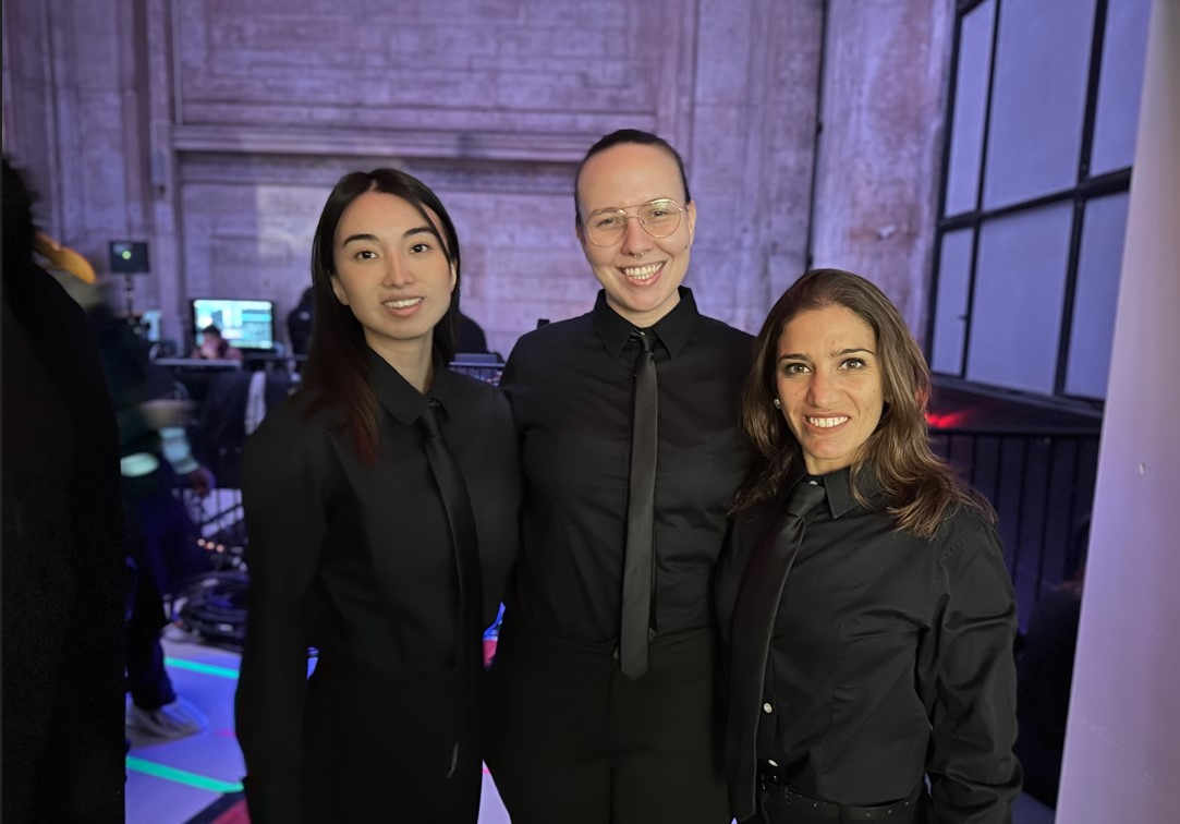 Wait staff resetting tables and service stations between courses