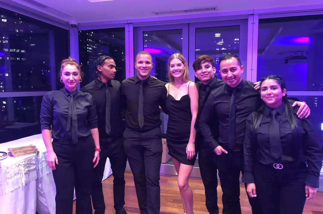 Professional catering staff serving guests