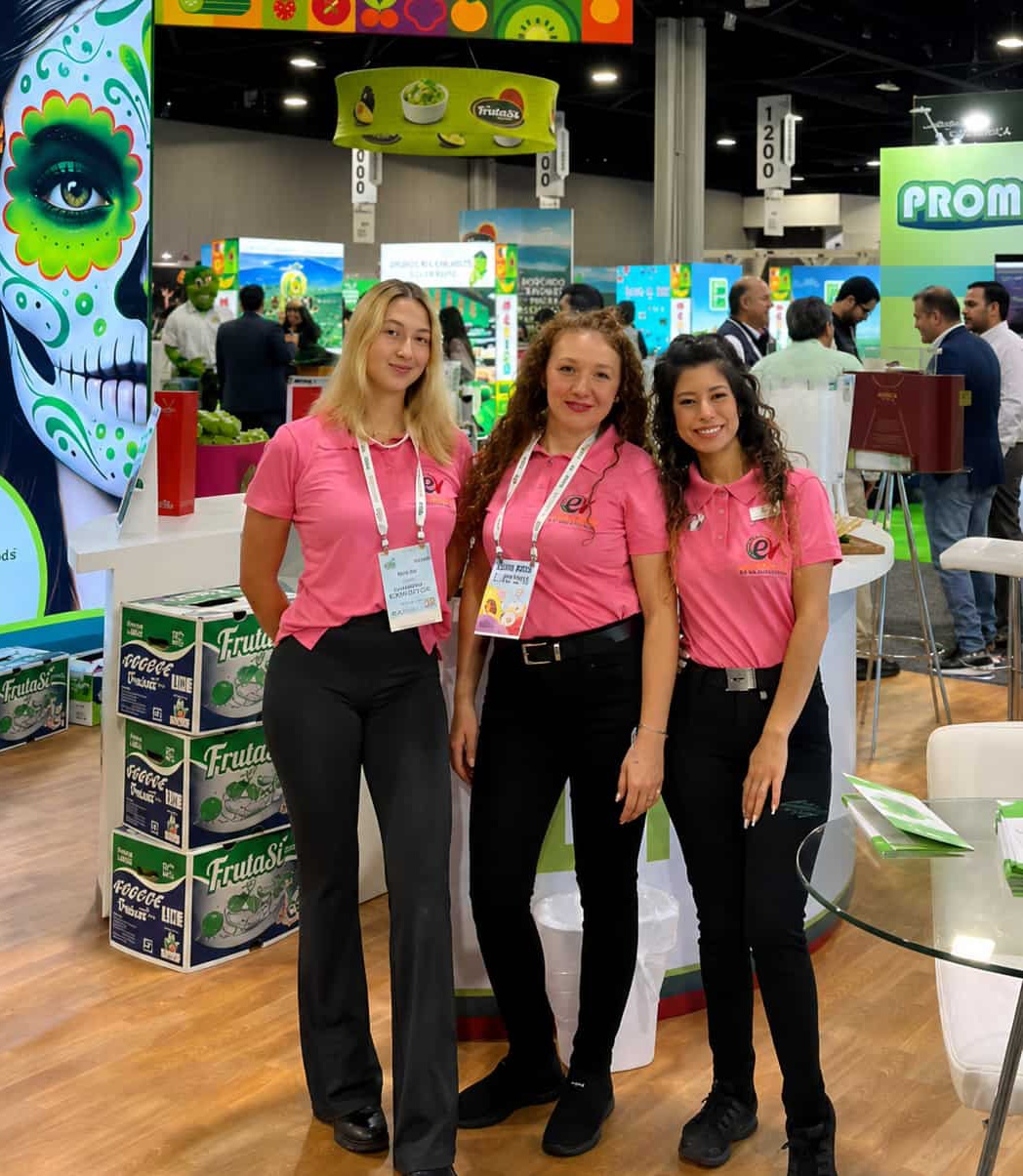 Bilingual brand ambassadors and event staff supporting a trade show activation at the Georgia World Congress Center in Atlanta with beverage service guest engagement and booth hospitality support